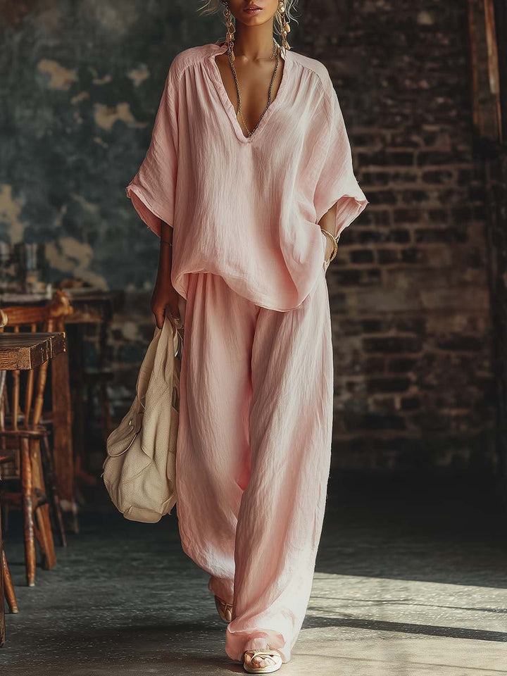 "Conjunto de Camisa y Pantalones con Escote en V de Samantha" podría reescribirse como: "Set de Camisa y Pantalones con Escote en V de Samantha".