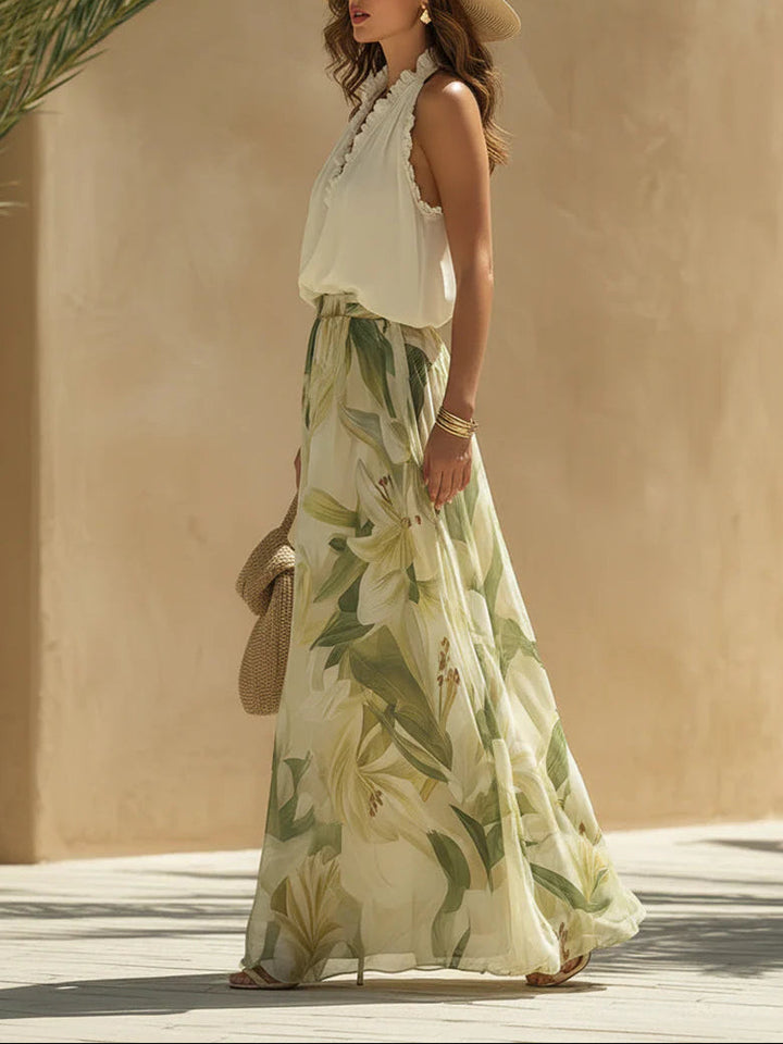 Alessandra - Blusa sin mangas de gasa con volantes y pantalones estampados con lirios