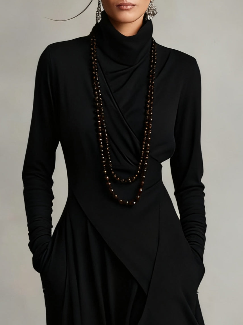 Aurelia · Vestido maxi plisado asimétrico con cuello alto