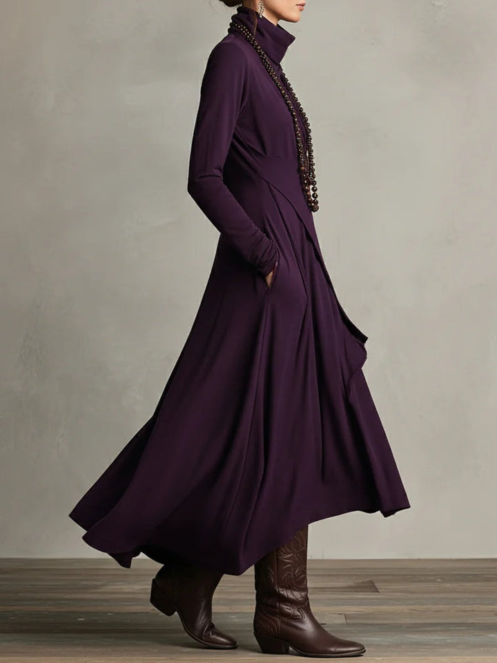 Aurelia · Vestido maxi plisado asimétrico con cuello alto