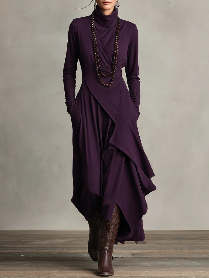 Aurelia · Vestido maxi plisado asimétrico con cuello alto