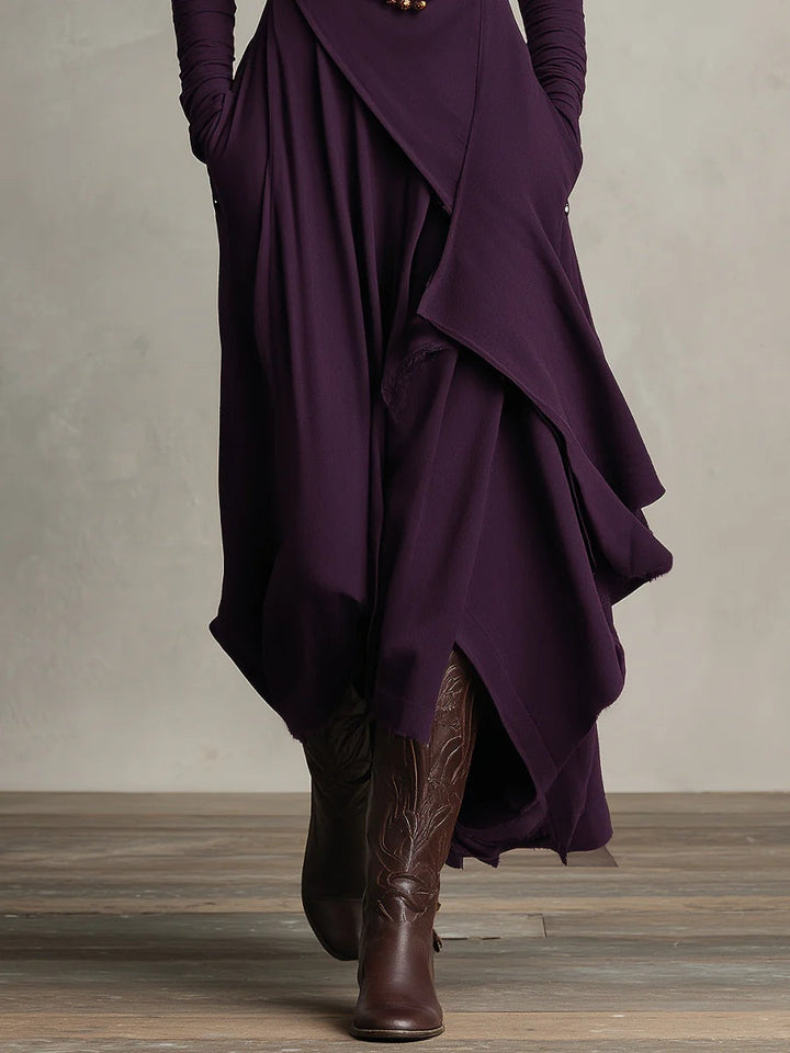 Aurelia · Vestido maxi plisado asimétrico con cuello alto